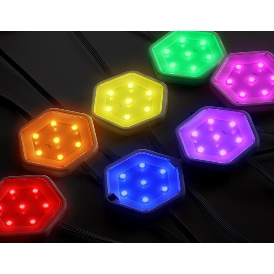 Six hexagonal LED lights glowing red, orange, yellow, green, blue and purple on a dark surface.